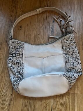 The Sak Cream Laser-Cut Leather Shoulder Bag with Tassel Accents